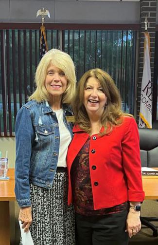 Janie Thompson (right) is congratulated by Redlands Community College Board of Regents Vice Chair Juanita Krittenbrink on her reappointment to the college’s Board of Regents.