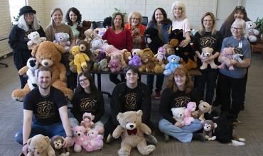 Academic Team delivers teddy bears to Russell-Murray Hospice