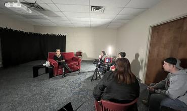 Students working in the studio with Coleman TV crew