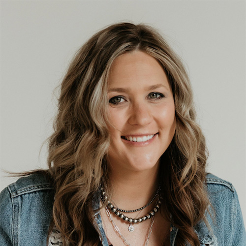 Woman in jean jacket and peweter jewelry