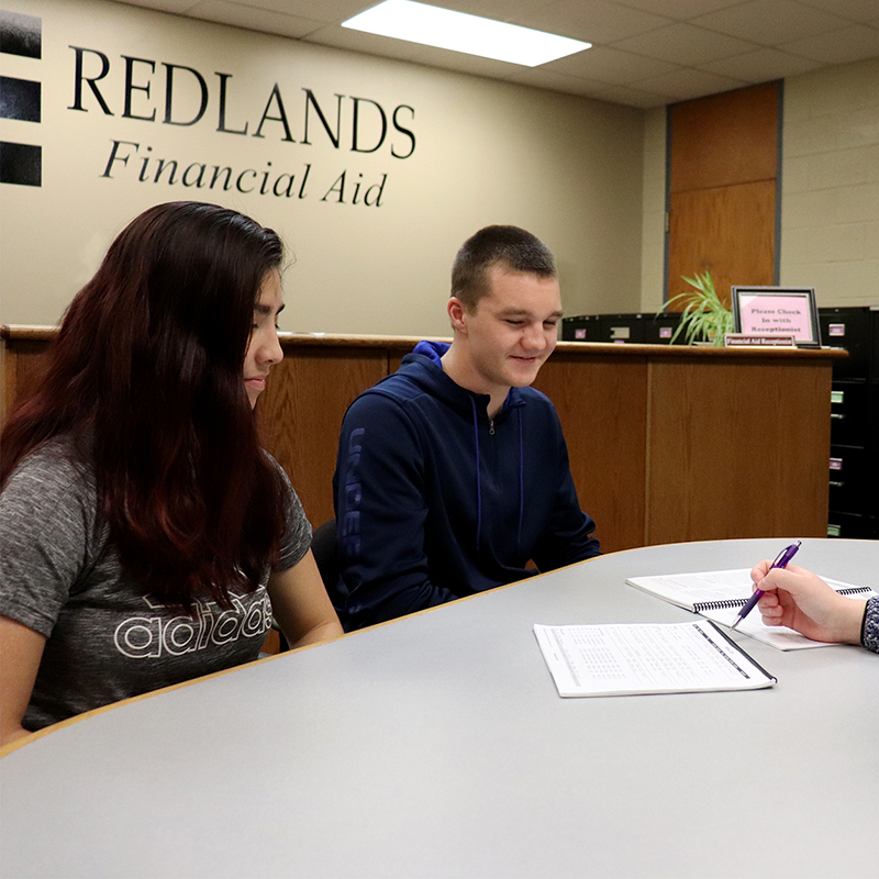 Students discussing financial aid